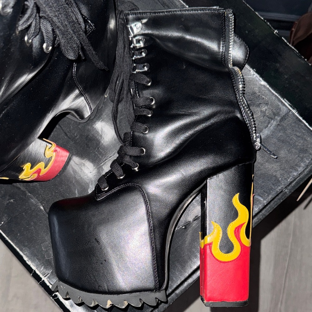 Demonia Black Lace-Up Boots with Red and Yellow Flame Design